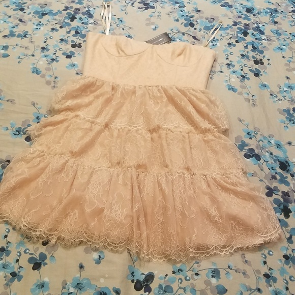 BCBG Dresses & Skirts - BCBG strapless mini dress Size 12 BCBG Dresses & Skirts - BCBG strapless mini dress Size 12